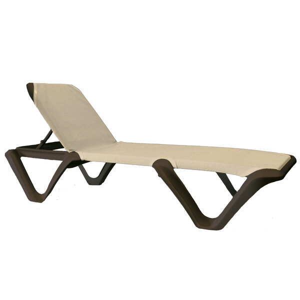 A tan resin sling chaise lounge chair with a wooden frame.