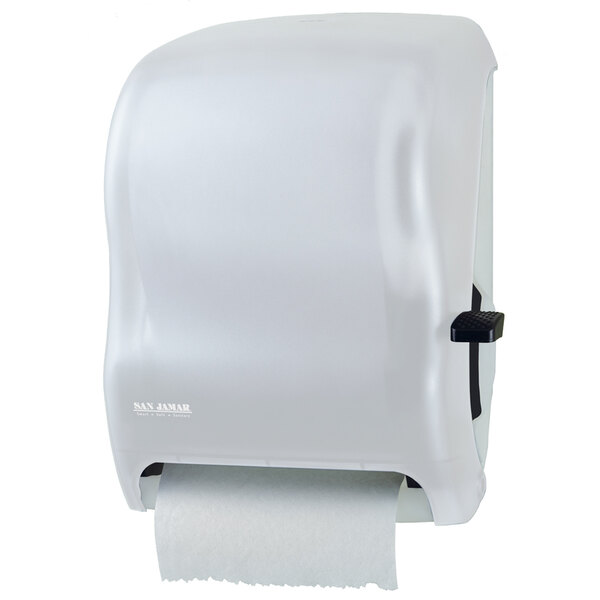 A white San Jamar paper towel dispenser with a black lever.