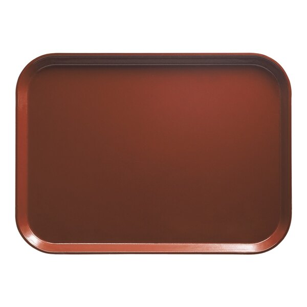 A rectangular red Cambro tray on a counter.