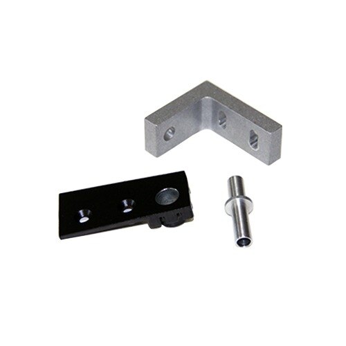 A black metal rectangular corner bracket with two holes on one side and one hole on the other.