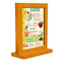 Menu Solutions WTFR-A 4" x 6" Country Oak Framed Wood Menu Tent with Straight Base