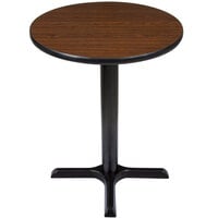 Lancaster Table & Seating Standard Height Table with 24" Round Reversible Walnut / Oak Table Top and Cross Cast Iron Base Plate
