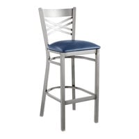 Lancaster Table & Seating Clear Coat Finish Cross Back Bar Stool with 2 1/2" Navy Vinyl Padded Seat - Detached