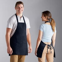 Choice Navy Blue Poly-Cotton Front of House Bib Apron with 3 Pockets - 25 inch x 28 inch