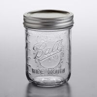 Ball 66000ZFP 16 oz. Pint Wide Mouth Glass Canning Jar with Silver Metal Lid and Band - 12/Case