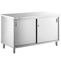 Regency 24" x 60" 16 Gauge Type 304 Stainless Steel Enclosed Base Table with Sliding Doors and Adjustable Midshelf