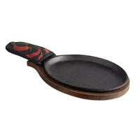 Choice 9 1/4" x 7" Oval Pre-Seasoned Cast Iron Fajita Skillet with Oak Finish Wood Underliner and Chili Pepper Cotton Handle Cover