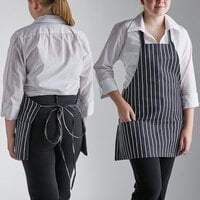 Choice Black and White Chalk Stripe Poly-Cotton Front of House Bib Apron with 3 Pockets - 25" x 28"