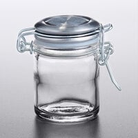 Tablecraft 10105 1.5 oz. Glass Condiment Jar with Stainless Steel Lid and Bail and Trigger Closure