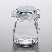 Tablecraft 10107 3 oz. Glass Condiment Jar with Stainless Steel Lid and Bail and Trigger Closure