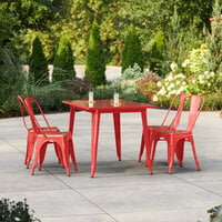Lancaster Table & Seating Alloy Series 47 1/2 inch x 29 1/2 inch Ruby Red Standard Height Outdoor Table with 4 Cafe Chairs