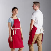 Choice Red Poly-Cotton Adjustable Bib Apron with 2 Pockets and Natural Webbing Accents - 32" x 30"
