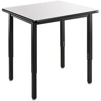 National Public Seating Adjustable Height Black Frame Utility Table with High-Pressure Laminate Whiteboard Top