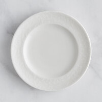 RAK Porcelain Bouquet 5 7/8" Ivory Embossed Wide Rim Porcelain Flat Plate - 24/Case