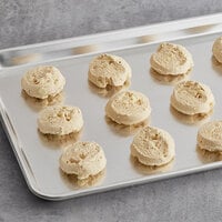 Otis Spunkmeyer Sweet Discovery Preformed White Chocolate Macadamia Nut Cookie Dough 1.33 oz. - 240/Case