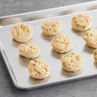 Otis Spunkmeyer Sweet Discovery Preformed White Chocolate Macadamia Nut Cookie Dough 2 oz. - 160/Case