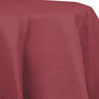 Creative Converting 923122 82" Burgundy OctyRound Tissue / Poly Table Cover - 12/Case