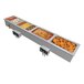 A Hatco drop-in hot food well with four compartments holding a variety of food.