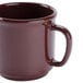 A brown GET SAN plastic coffee mug with a handle.