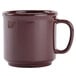 A brown GET plastic coffee mug with a handle.