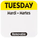 A yellow National Checking Company label with black text reading "Tuesday" and a black border.