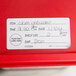 A white National Checking Company label on a red container.
