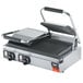 A Vollrath stainless steel double panini grill with two burners and a handle.