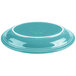 A turquoise oval platter with a white rim.