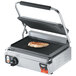 A Vollrath panini grill with a panini on it.
