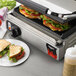 A Vollrath Panini Sandwich Grill with a sandwich on it.