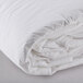 A close-up of a white Oxford 100% Cotton Hotel Duvet Insert on a white surface.