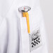 A white lab coat pocket with a yellow Taylor 3621N pocket probe thermometer in it.