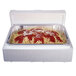 A Polar Tech insulated shipping box with a foam container of spaghetti inside.