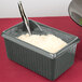 A Tablecraft gray rectangular server with food inside and a spoon.