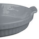 A gray Tablecraft cast aluminum shallow oval casserole dish with a handle.