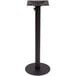A BFM Seating black metal table base with a metal pedestal and umbrella hole.