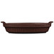 A brown cast aluminum Tablecraft small shallow oval casserole dish with a handle.