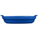 A blue cast aluminum Tablecraft small shallow oval casserole dish with handles.