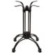 A black metal BFM Seating Boca outdoor table stand with four legs.