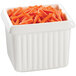 A white Tablecraft rectangle server with carrot sticks in it.