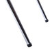 A close-up of a pair of metal rods with a black rubber tip.
