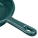 A Tablecraft hunter green cast aluminum fry pan with a handle.
