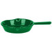 A green pan with a handle.