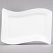 A CAC Miami rectangular bone white porcelain platter with a curved edge.