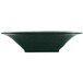A hunter green and white speckled cast aluminum square bowl on a counter in a salad bar.