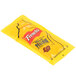 A yellow French's Classic Yellow Mustard packet with a yellow and red label.