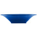 A Tablecraft cobalt blue cast aluminum square bowl on a table in a salad bar.