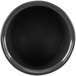 A close-up of a black Tablecraft salad dressing bowl with a white circle inside.