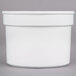 A white cast aluminum round bowl with a rim.