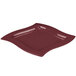 A square maroon speckled cast aluminum platter with a curved edge.